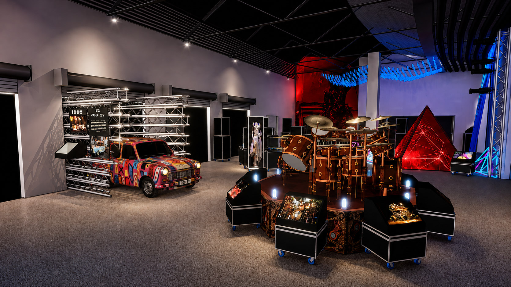 Rendering: full gallery view with a road case wall and marquee sign at left, U2's Zoo TV Trabant hanging in truss at center, Neil Peart's Time Machine drum kit on a raised platform, and a red LED pyramid glowing beyond with blue light tubes suspended overhead